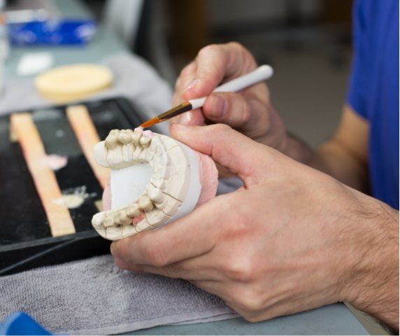 Vero Beach Florida dentist designing a dental prosthetic