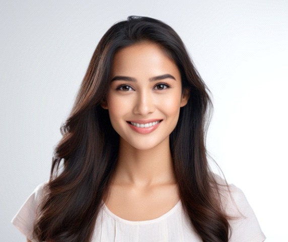 Smiling young woman with beautiful skin